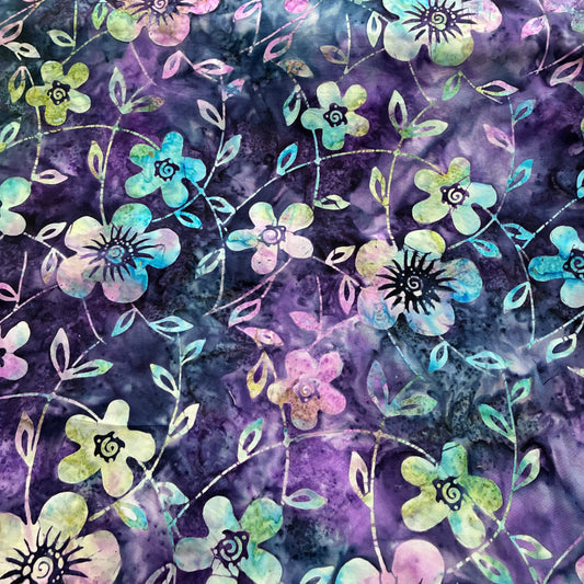 Floral pattern with colorful flowers on a purple background
